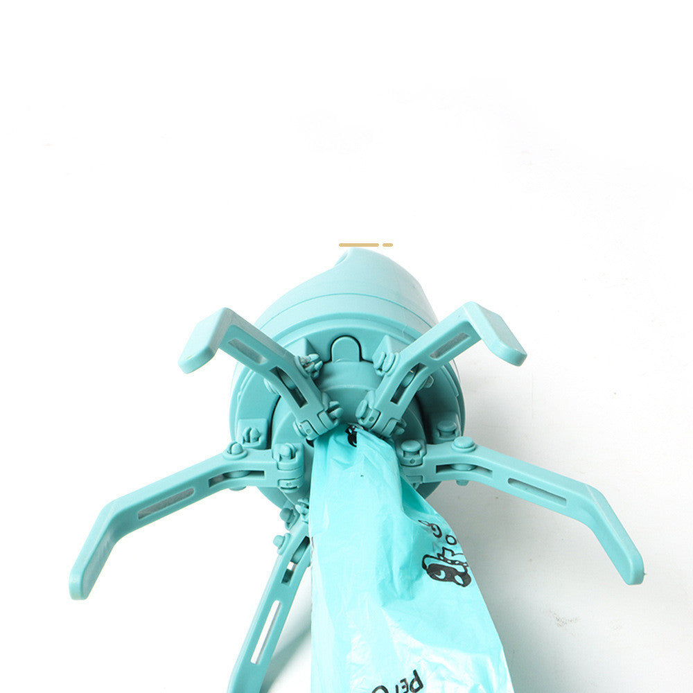 Paletta portatile con distributore di sacchetti incorporato