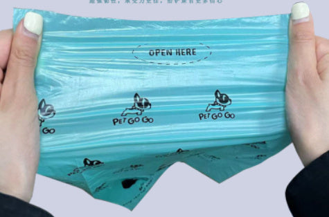 Paletta portatile con distributore di sacchetti incorporato